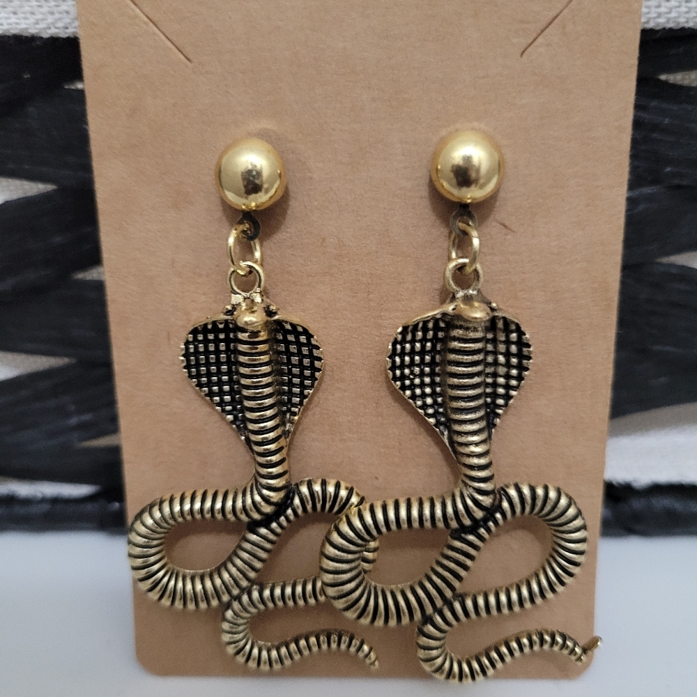 Brand new! Fierce cobra earrings